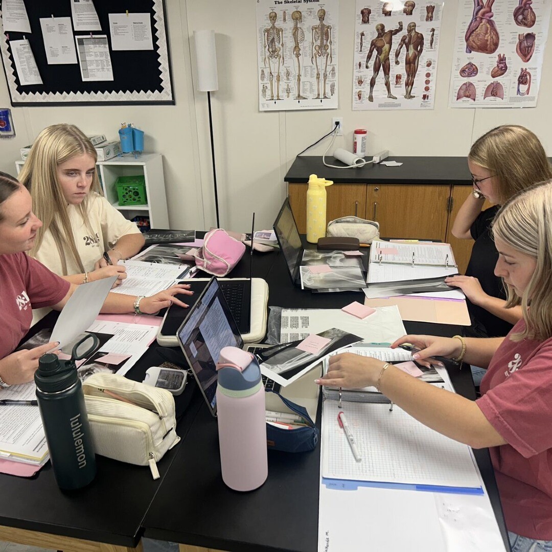 biology lab students looking at x-rays