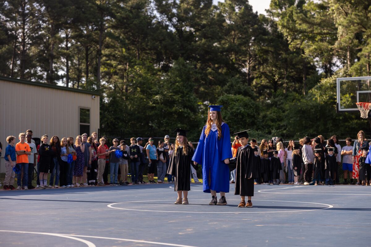 kinder and high school graduates