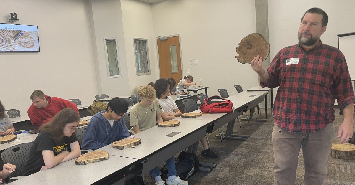 forestry class looks at tree circles