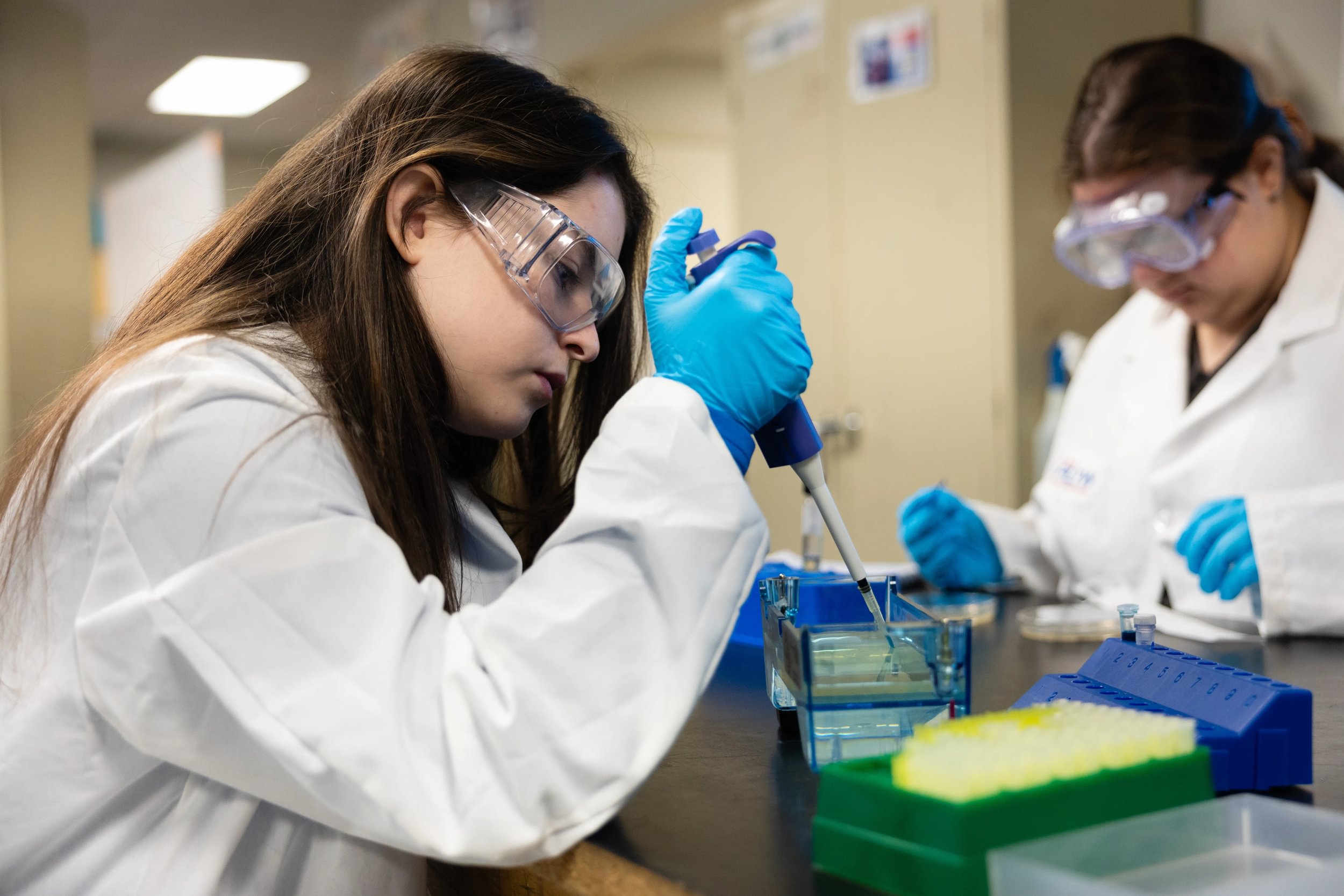 high school student in lab